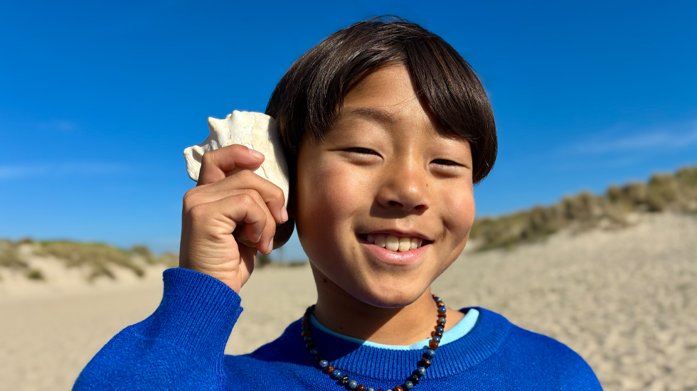 48MP Fusionカメラで撮影した写真。次世代のポートレート機能を使って人物の顔にフォーカスしている