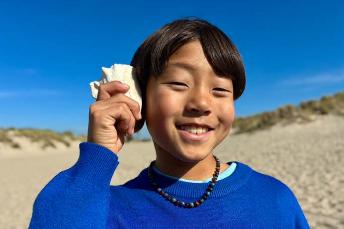 48MP Fusionカメラで撮影した写真。次世代のポートレート機能を使って人物の顔にフォーカスしている