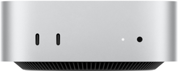 Mac miniの前面。2つのThunderboltポート、ステータスインジケータランプとヘッドフォンジャック、逆台形の形状をしたブラックのベース部、平らな上部、丸みを帯びた側面、直線的なエッジ。カラーはシルバー