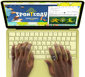 シトラスのMacBook Neo。キーボードの上に手が置かれている。ユーザーが美術展の開会への招待Eメールを作成していて、隣にそのイベントのウェブサイトが開かれている